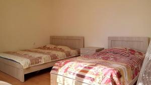 Letto o letti in una camera di Mari Guest House