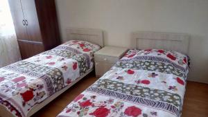 Letto o letti in una camera di Mari Guest House