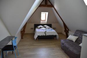 Postel nebo postele na pokoji v ubytování Chez Nathalie Techer