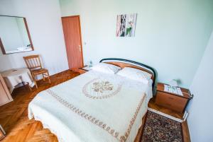 Кровать или кровати в номере Haus Silvia