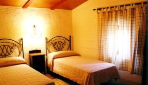 Кровать или кровати в номере Mas Peraquintana