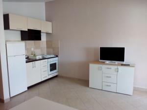 Kuchyň nebo kuchyňský kout v ubytování Apartments Jurjevic