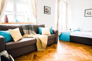 Posteľ alebo postele v izbe v ubytovaní 3D Royal Castle Apartament