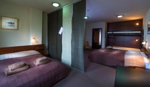 Postel nebo postele na pokoji v ubytování Apartmán Chrúst + 7 fotografií