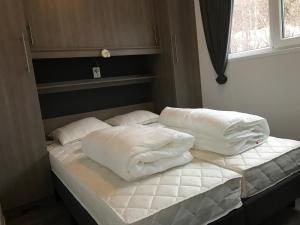 Кровать или кровати в номере Granmo Camping