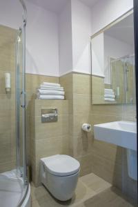 Koupelna v ubytování Hotel Alex