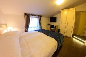 Postel nebo postele na pokoji v ubytování Guest House Šterk