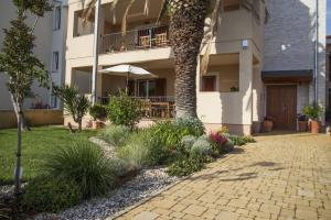 Vonkajšia záhrada v ubytovaní Apartment Varga
