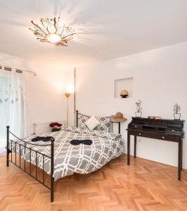 Posteľ alebo postele v izbe v ubytovaní Magnolia Apartments + 37 fotografií