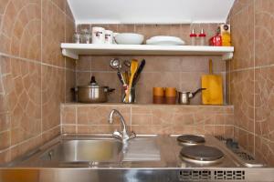 Kuchyň nebo kuchyňský kout v ubytování Apartment Center Marija