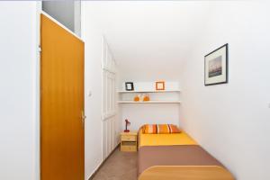 Postel nebo postele na pokoji v ubytování Apartment Center Marija