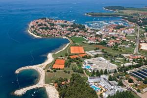 an aerial view of a small island in the water at Apartments Nautica II in Novigrad Istria