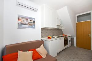 Kuchyň nebo kuchyňský kout v ubytování Apartment Center Marija