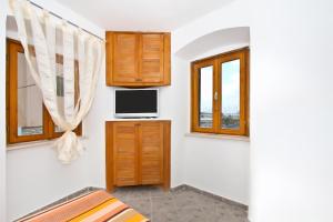 Kuchyň nebo kuchyňský kout v ubytování Apartment Center Marija