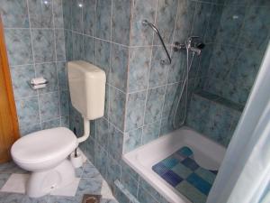 Koupelna v ubytování Apartment Center Marija