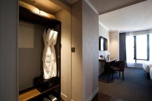 Rúm í herbergi á G2 Hotel Myeongdong
