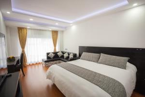 Ένα ή περισσότερα κρεβάτια σε δωμάτιο στο Hotel Palermo Suite
