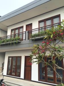 Balkón nebo terasa v ubytování Bali Full Moon Guest House