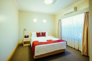 Katil atau katil-katil dalam bilik di Club Motor Inn
