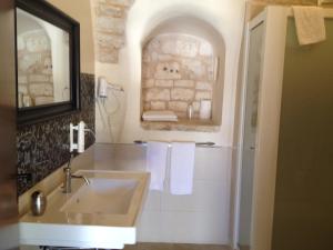 Koupelna v ubytování Masseria Casale Dei Fornici