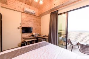 TV a/nebo společenská místnost v ubytování Tiamo B&B