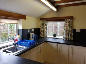 Köök või kööginurk majutusasutuses Oak Cottage
