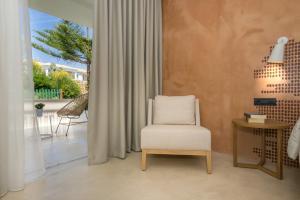 Posezení v ubytování Bitzaro Grande Hotel & Suites