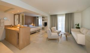 Posezení v ubytování Bitzaro Grande Hotel & Suites