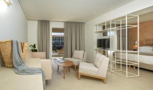 Posezení v ubytování Bitzaro Grande Hotel & Suites