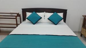 Letto o letti in una camera di Sunhill Lake Tourist Rest