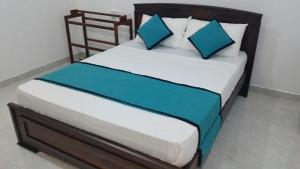 Кровать или кровати в номере Sunhill Lake Tourist Rest