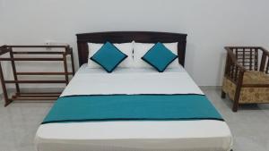 Letto o letti in una camera di Sunhill Lake Tourist Rest