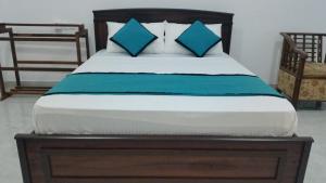 Letto o letti in una camera di Sunhill Lake Tourist Rest