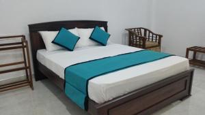 Letto o letti in una camera di Sunhill Lake Tourist Rest