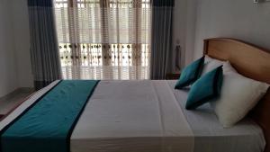 Letto o letti in una camera di Sunhill Lake Tourist Rest