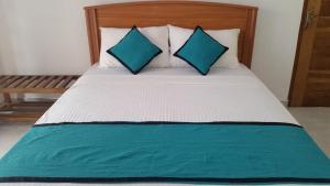 Letto o letti in una camera di Sunhill Lake Tourist Rest