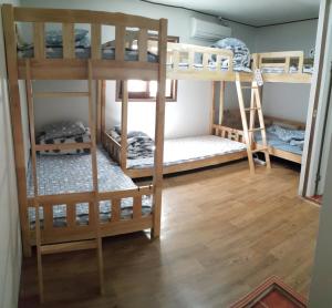 Postel nebo postele na pokoji v ubytování Friends of Loft