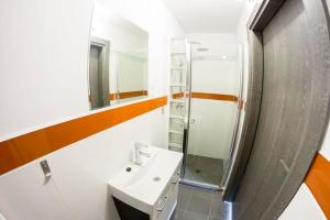 Kúpeľňa v ubytovaní Park Apartament + 37 fotografií