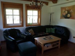 Posezení v ubytování Ferienwohnung Zum Heuschober