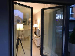 Posteľ alebo postele v izbe v ubytovaní Widok na Mazury Apartament przy Porcie