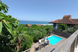 a view of the ocean from the deck of a villa at 31 Milkwood in Ballito