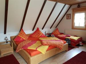 Postel nebo postele na pokoji v ubytování Ferienwohnung Zum Heuschober