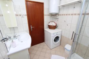 Koupelna v ubytování Apartments Pataj