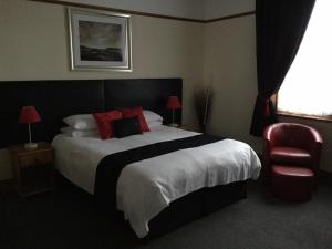 Кровать или кровати в номере Woodlands Guest House