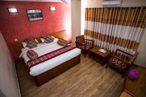 Letto o letti in una camera di Hotel Crown Plaza