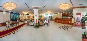 Area soggiorno di Amjad Al Deafah Hotel