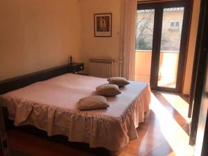 Posteľ alebo postele v izbe v ubytovaní Apartman Belle Maison