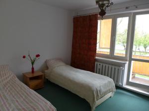 Posteľ alebo postele v izbe v ubytovaní Apart