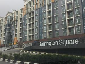 a large building with a sign in front of it at Cameron Barrington Square 1Room @ Golden Hill in Cameron Highlands