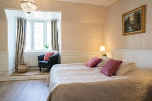Katil atau katil-katil dalam bilik di Halmstad Hotell & Vandrarhem Kaptenshamn